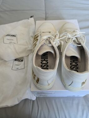 Moschino White Sneakers with Gold Logo Detailing